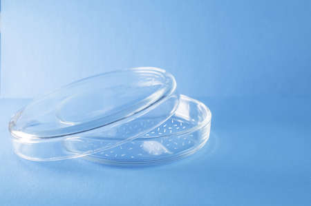 Medicine. Spermatozoa in a petri dish on a blue background. Elements of a bitmap drawing. Family...