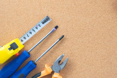 Men's work. The repair tools are on the table. The concept of housework, workshop. Close-up.