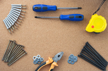 Men's work. The repair tools are on the table. The concept of housework, workshop. Close-up.の写真素材