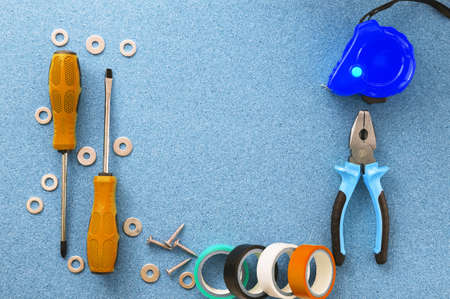 Men's work. The repair tools are on the table. The concept of housework, workshop. Close-up.の写真素材