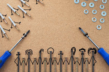 Repair. Self-tapping screws, washers, and screwdrivers with bitmap elements on the desktop. The concept of a repair shop Close-up.の写真素材
