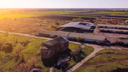 top view over an old farm and a ruined temple.の写真素材