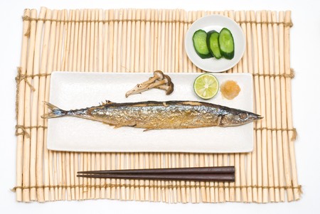 Grilled saury on the Lunch matの写真素材