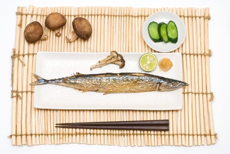 Grilled saury on the Lunch matの写真素材