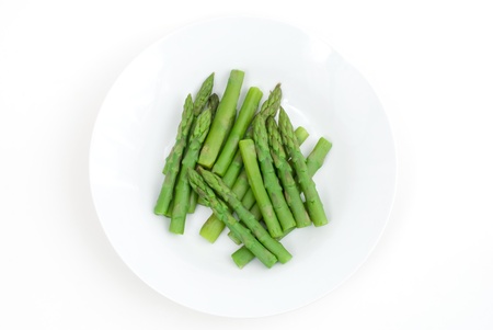 Boiled asparagus on the white plateの写真素材