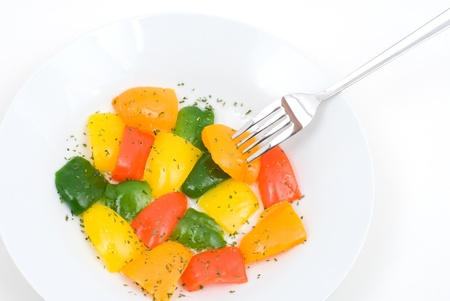 Colorful bell pepper salad in the plateの写真素材