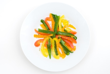 Colorful bell pepper salad in the plateの写真素材