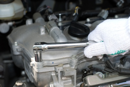 Maintenance a car to examine the engine condition
