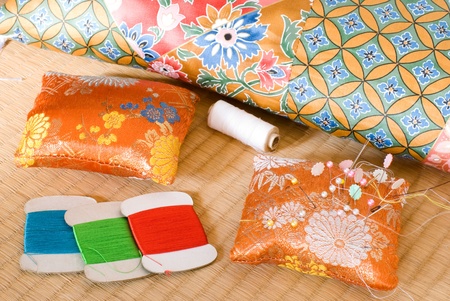 Japanese pin cushion and mattresses on the straw matの写真素材