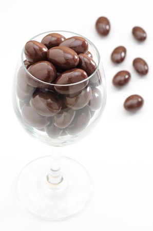 Chocolate ball in the wine glass on white backgroundの写真素材