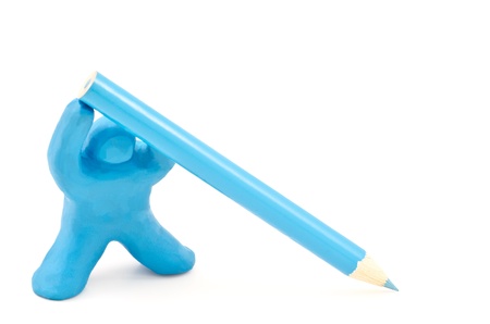 Clay doll hold a blue pencil isolated on white backgroundの写真素材