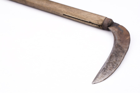 Close up worn out japanese sickle on white backgroundの写真素材