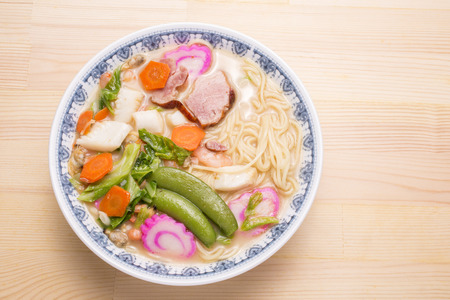 Noodles with seafoods and various vegetables in bowl called Champonの写真素材