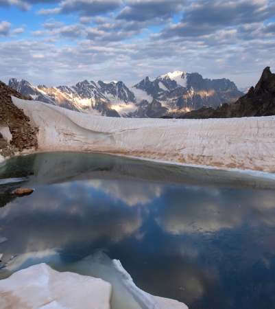 the glaciers are melting in summer, forming streams and lakesの写真素材