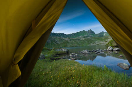 hiking in a mountain at nightの写真素材