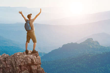 man hiking in mountainsの写真素材