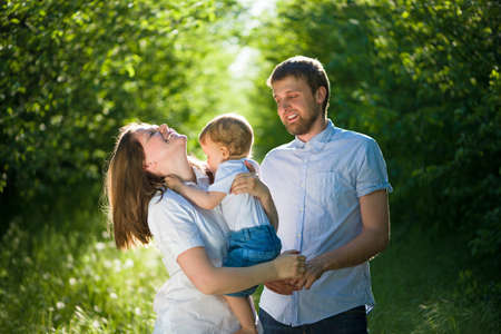 happy family having fun outdoorsの写真素材