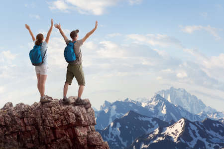 couple hiking in the mountainsの写真素材
