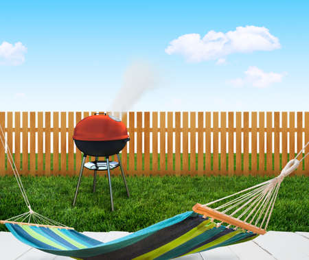 kettle barbecue grill on backyardの写真素材