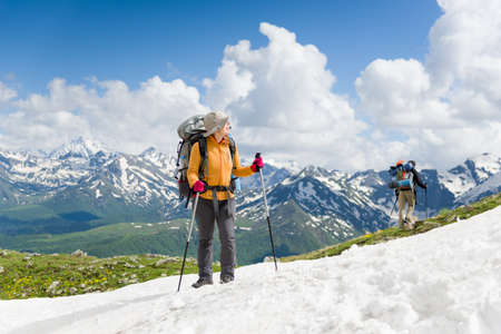 people hiking in mountainsの写真素材