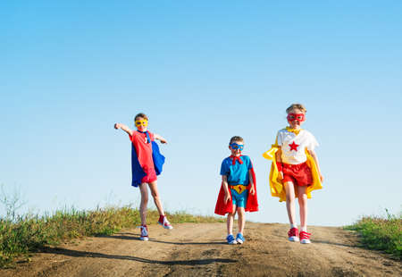 children  acting like a super heroの写真素材