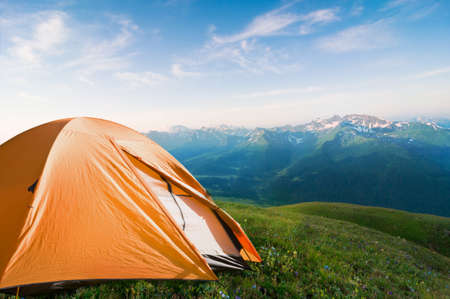 tourist tent camping in mountainsの写真素材