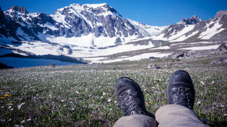 man hiking in mountainsの写真素材