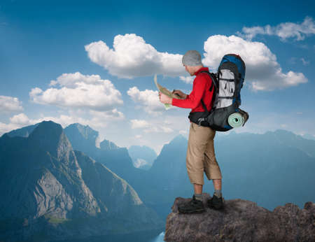 man hiking in mountainsの写真素材