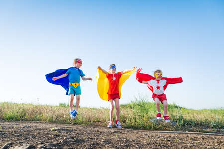 children acting like a superheroの写真素材