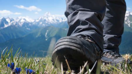 man hiking in mountainsの写真素材