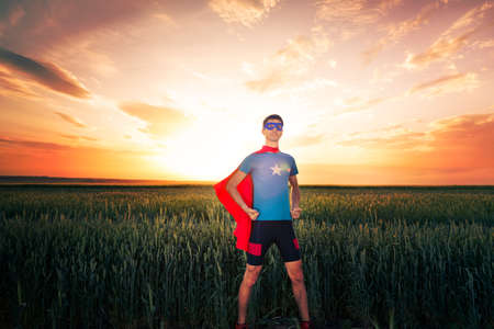 a man acts like a superheroの写真素材