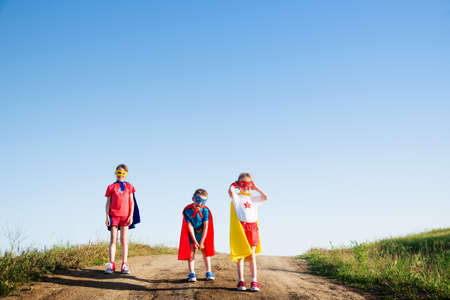 children acting like a superheroの写真素材