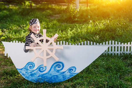 kid plays pirate at backyardの写真素材