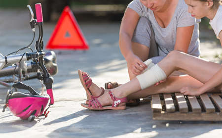 child after bicycle accidentの写真素材