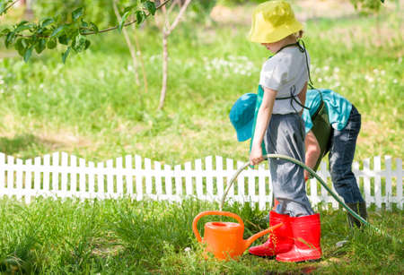 children gardening and wateringの写真素材