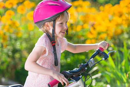 child with bicycleの写真素材