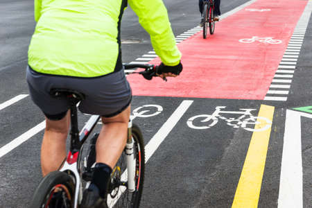 cyclists in city streetの写真素材