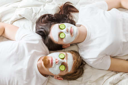 Couple getting homemade facial maskの写真素材