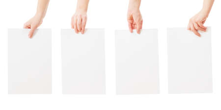 hands holding blank paper isolatedの写真素材