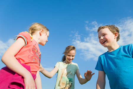 kids play outdoorsの写真素材