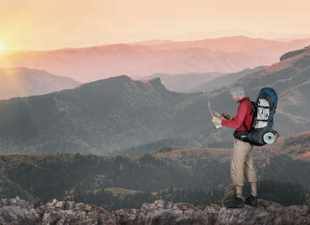 man hiking in mountainsの写真素材