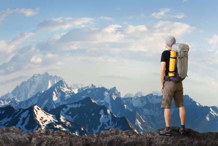 man hiking in mountainsの写真素材