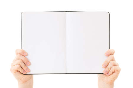 hand holding blank notebook isolatedの写真素材