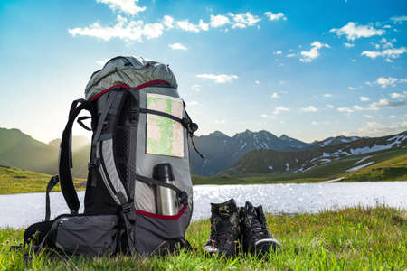 hiking backpack and boots outdoorsの写真素材
