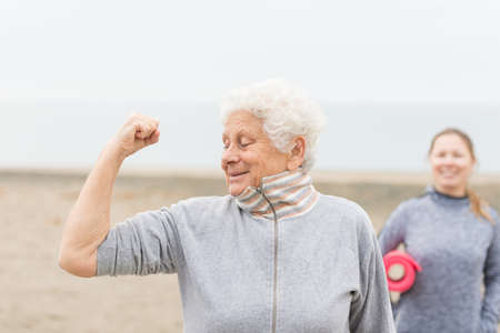 senior woman exercising outdoorの写真素材
