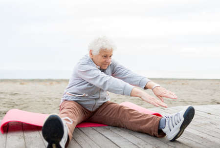 senior woman workout outdoorの写真素材