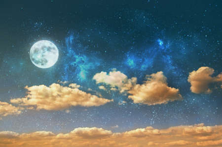 night sky background with stars, moon and cloudsの写真素材