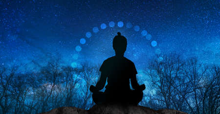 Yoga cosmic space meditation illustration, silhouette of man practicing outdoors at nightの写真素材