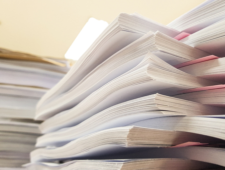 Stacks Paper document with pink paper,office concept background.の写真素材