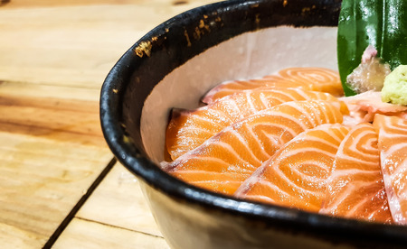 salmon sashimi with rice in Japanese restaurant.の写真素材